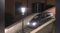 Watch: Man gets stuck driving car down Rome’s Spanish Steps